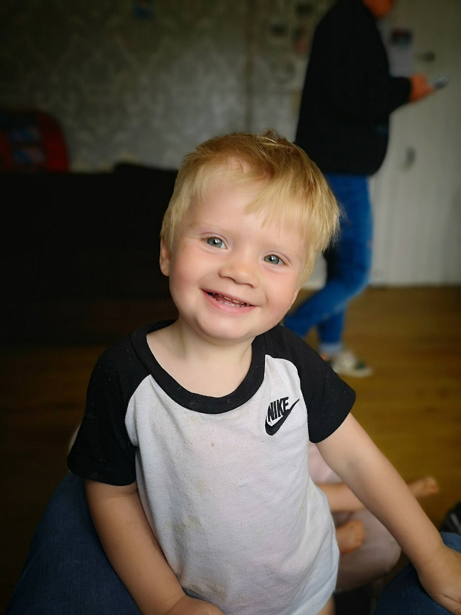 Logan joined the competition — help win amazing prizes! arm, blond, cheek, child, ear, eye, face, facial_expression, fun, hair, hairstyle, head, iris, joy, person, sitting, skin, smile, standing, t_shirt