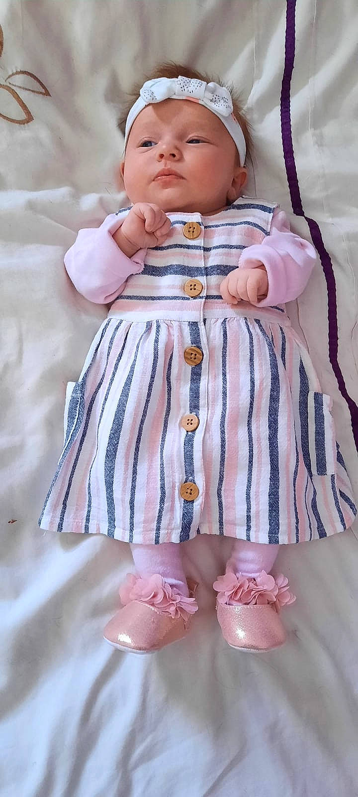 Ivy-mae joined the competition — help win amazing prizes! baby, baby_products, baby_toddler_clothing, child, day_dress, dress, happy, headwear, linens, magenta, outerwear, pattern, person, pink, purple, skin, sleeve, textile, toddler, violet