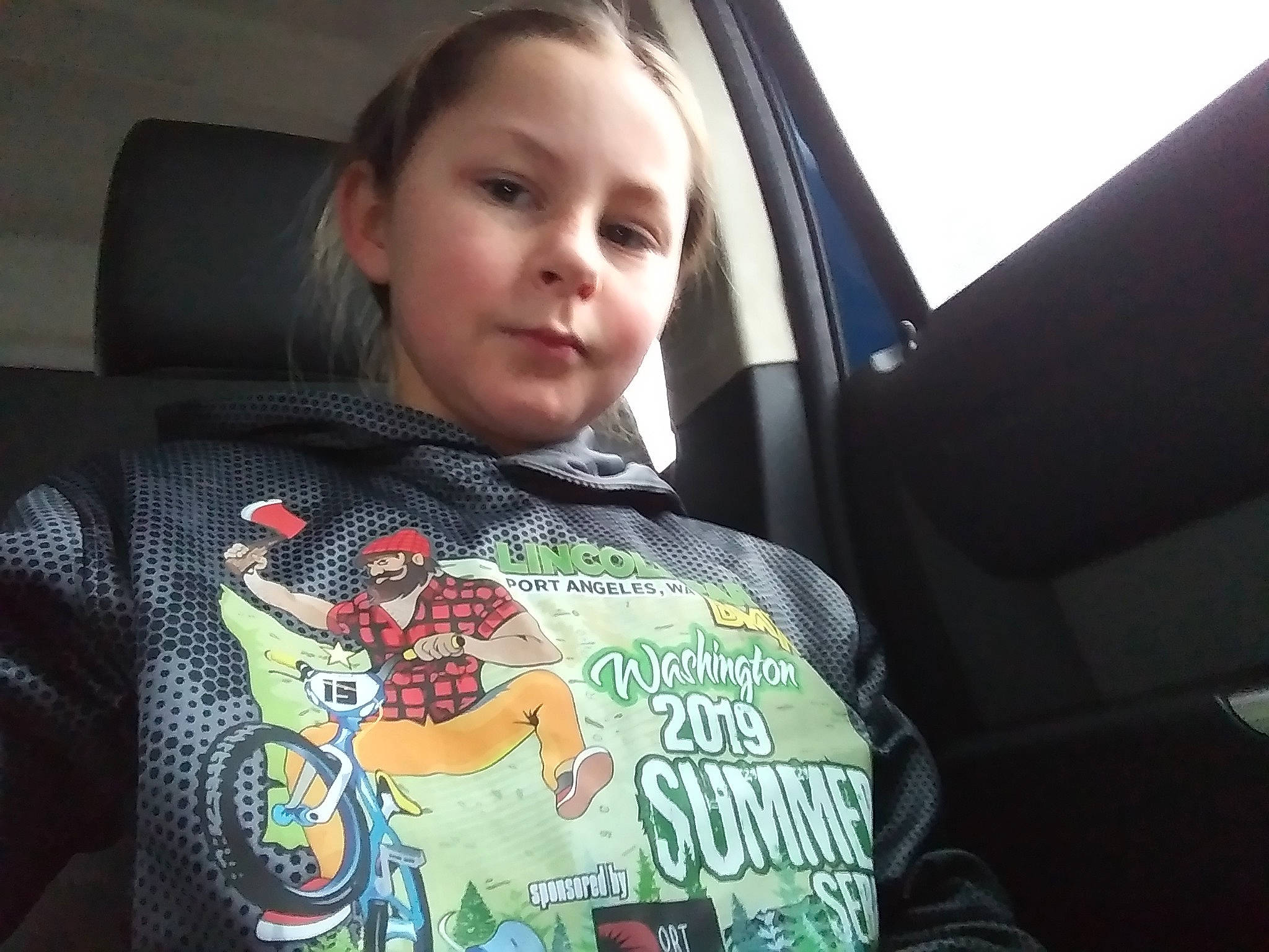 Annalee is registered to the contest to win money with this photo: car_seat, child, cool, electronic_device, person, photography, plant, product, t_shirt, technology, toddler, tree, vacation