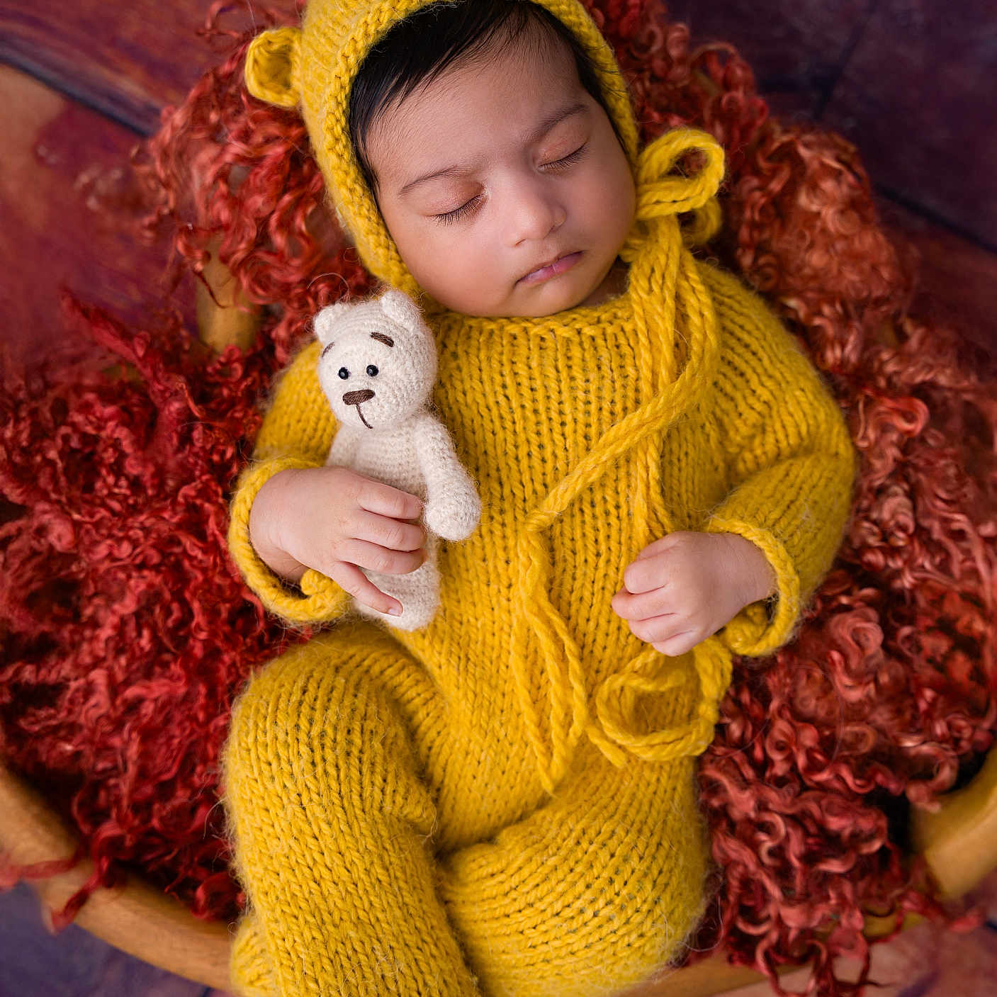 Zorayan is registered to the contest to win money with this photo: baby, beanie, bodypart, bonnet, cap, clothing, doll, face, finger, hand, happy, hat, head, knitwear, person, photography, portrait, smile, sweater, toy