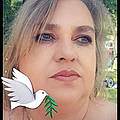 Nelly E.