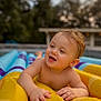 toddler, child, water, pool, inflatable, yellow, summer, happy, playful, outdoor, wet, splash, skin, face, hands, float, relaxation, daylight, nature, fun