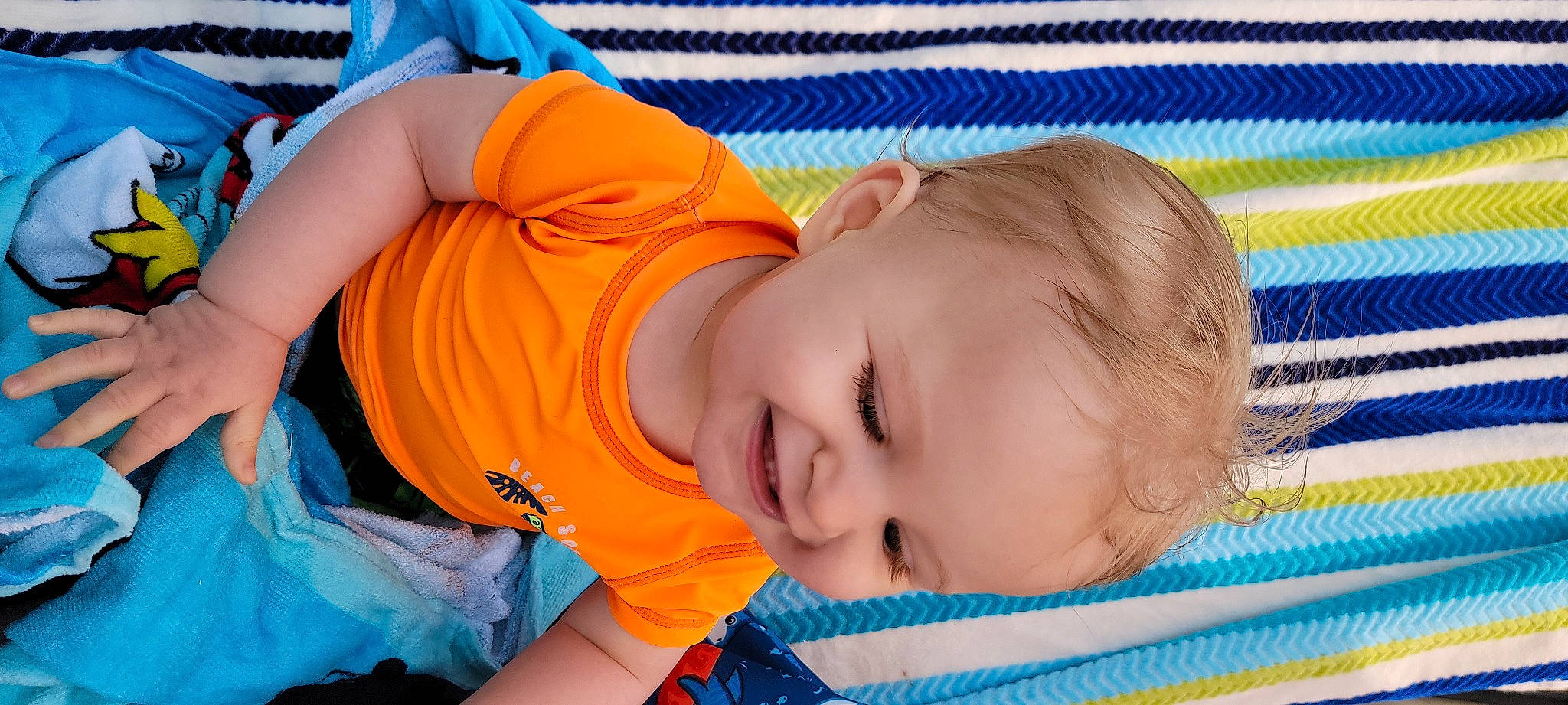 Ledger joined the competition — help win amazing prizes! baby, baby_products, baby_toddler_clothing, bedtime, blue, cheek, child, comfort, electric_blue, fun, happy, human_body, leisure, nose, orange, pattern, person, play, skin, smile