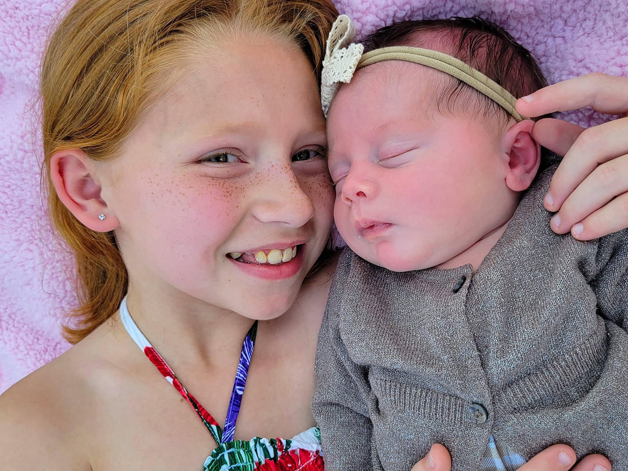 Rialey is registered to the contest to win money with this photo: azure, baby_toddler_clothing, chin, community, ear, eyelash, facial_expression, finger, gesture, hairstyle, hand, happy, head, human, iris, joy, neck, person, photograph, skin