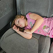 Mattie joined the competition — help win amazing prizes! child, sleeping, car_seat, pink_shirt, patches, fries, strawberry, hair, face, arm, relaxed, interior, vehicle, seat, clothing, casual, young, resting, daylight, portrait