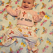 Maesyn joined the competition — help win amazing prizes! baby, child, smiling, blanket, butterfly_pattern, pink_clothing, headband, cross, lamb, bunny, happy, infant, cute, laying_down, patterned_pants, soft_texture, indoors, portrait, cheerful, baby_clothes