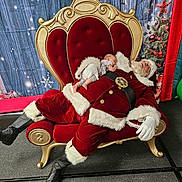 Maesyn joined the competition — help win amazing prizes! baby, santa_claus, throne, red_velvet, gold_trim, christmas_tree, holiday_decor, snowflakes, sleeping, festive, indoor, carpet, boots, gloves, white_beard, christmas_ornaments, holiday_season, nap, relaxation, portrait