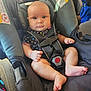 Maesyn is registered to the contest to win money with this photo: baby, car_seat, child, infant, safety_harness, seatbelt, clothing, foot, hand, face, expression, indoor, car_interior, seat, cute, person, young_child, sitting, cute_baby, straps