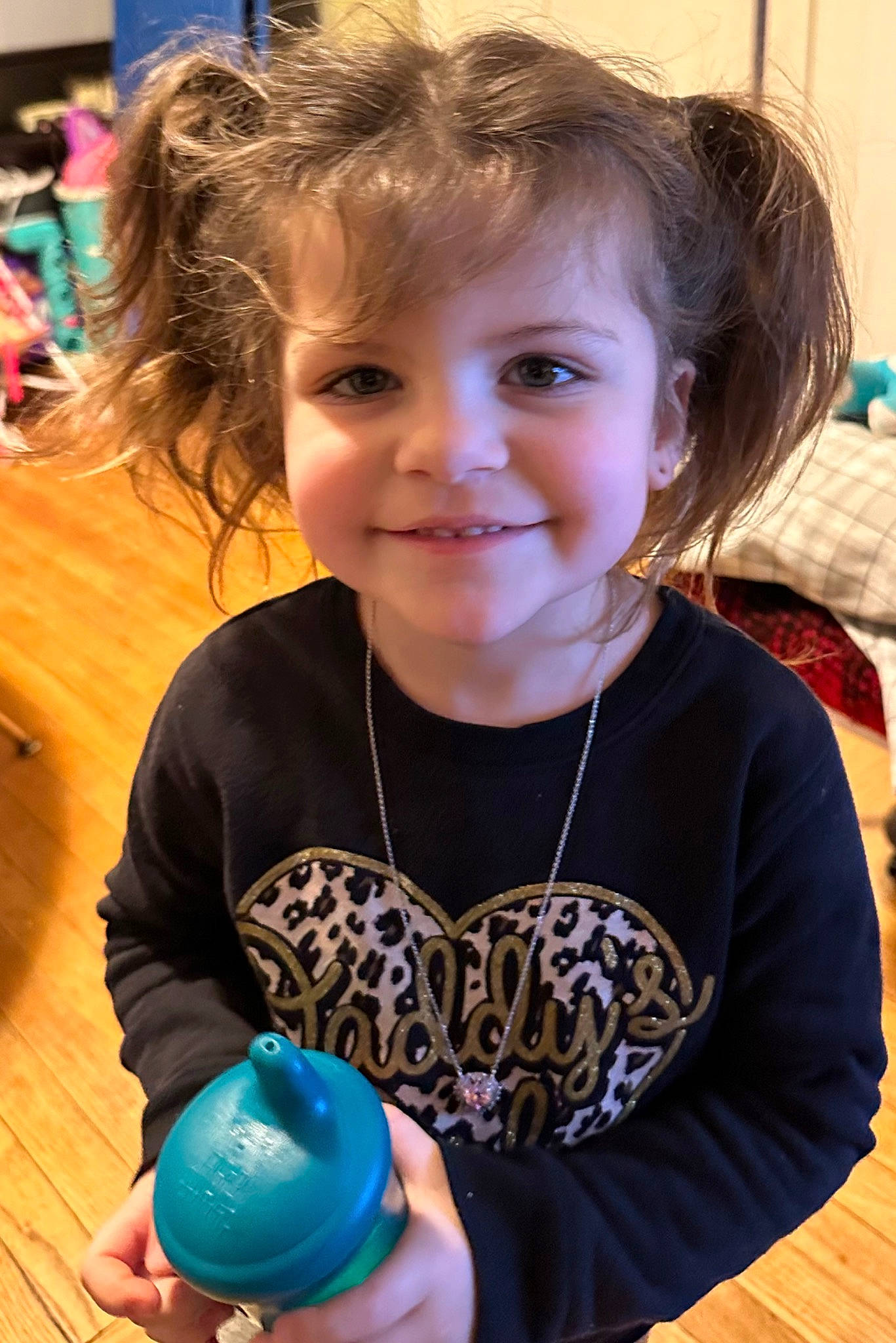 Luna is registered to the contest to win money with this photo: blond, blue, child, electric_blue, event, fun, hair, happy, head, iris, joy, leisure, party, person, play, sitting, skin, smile, t_shirt, toddler