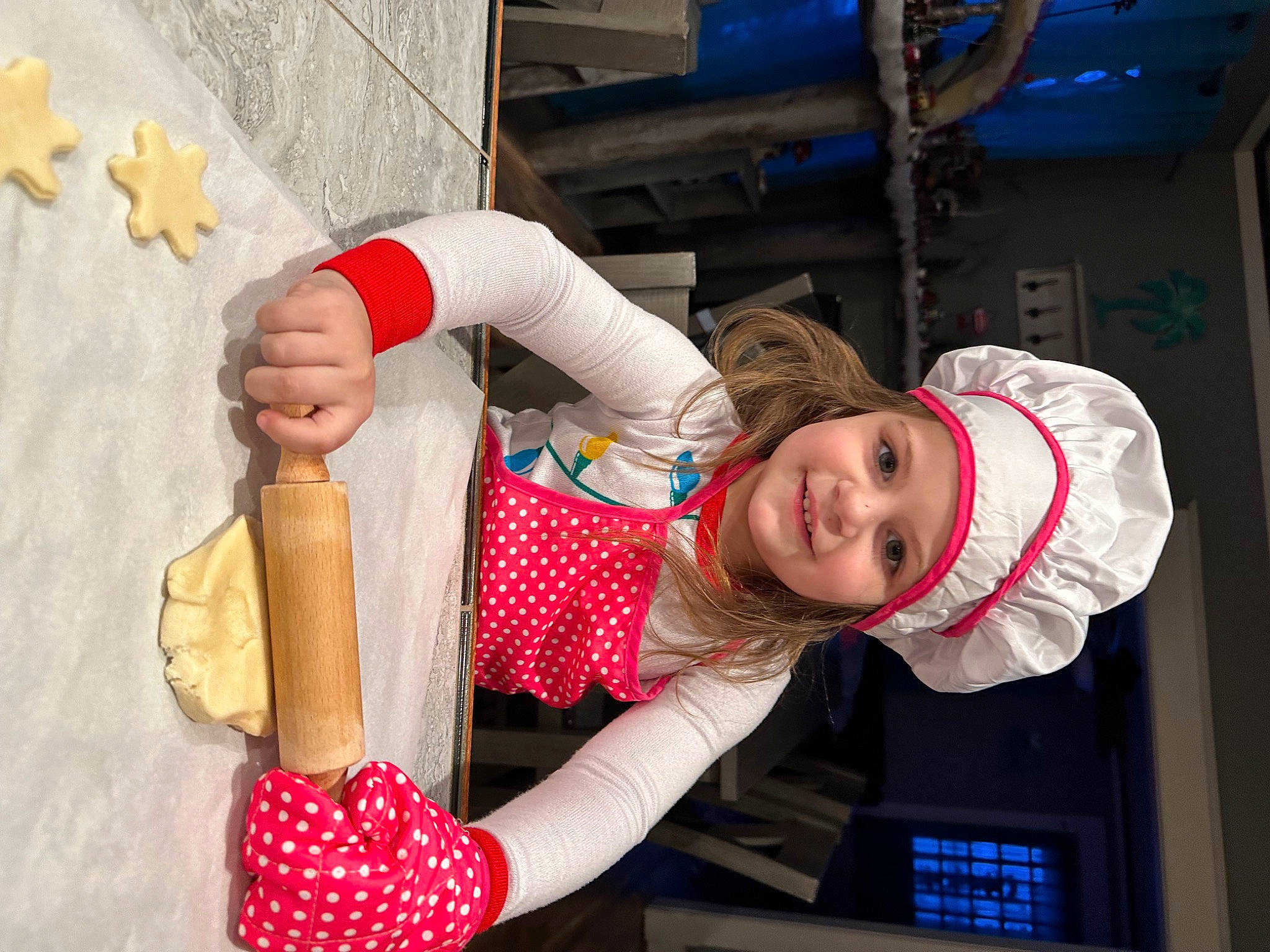 Luna joined the competition — help win amazing prizes! child, elbow, event, food, fun, happy, hat, headwear, holiday, human_leg, joy, pattern, person, red, room, sleeve, smile, sock, tableware, thigh