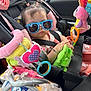 Marisol joined the competition — help win amazing prizes! accessories, baby, baby_clothes, bracelet, car, car_interior, car_seat, child, cute, green_toy, infant, pigtails, pink, plush_toys, seatbelt, stuffed_animal, sunglasses, toddler, toy_ring, travel