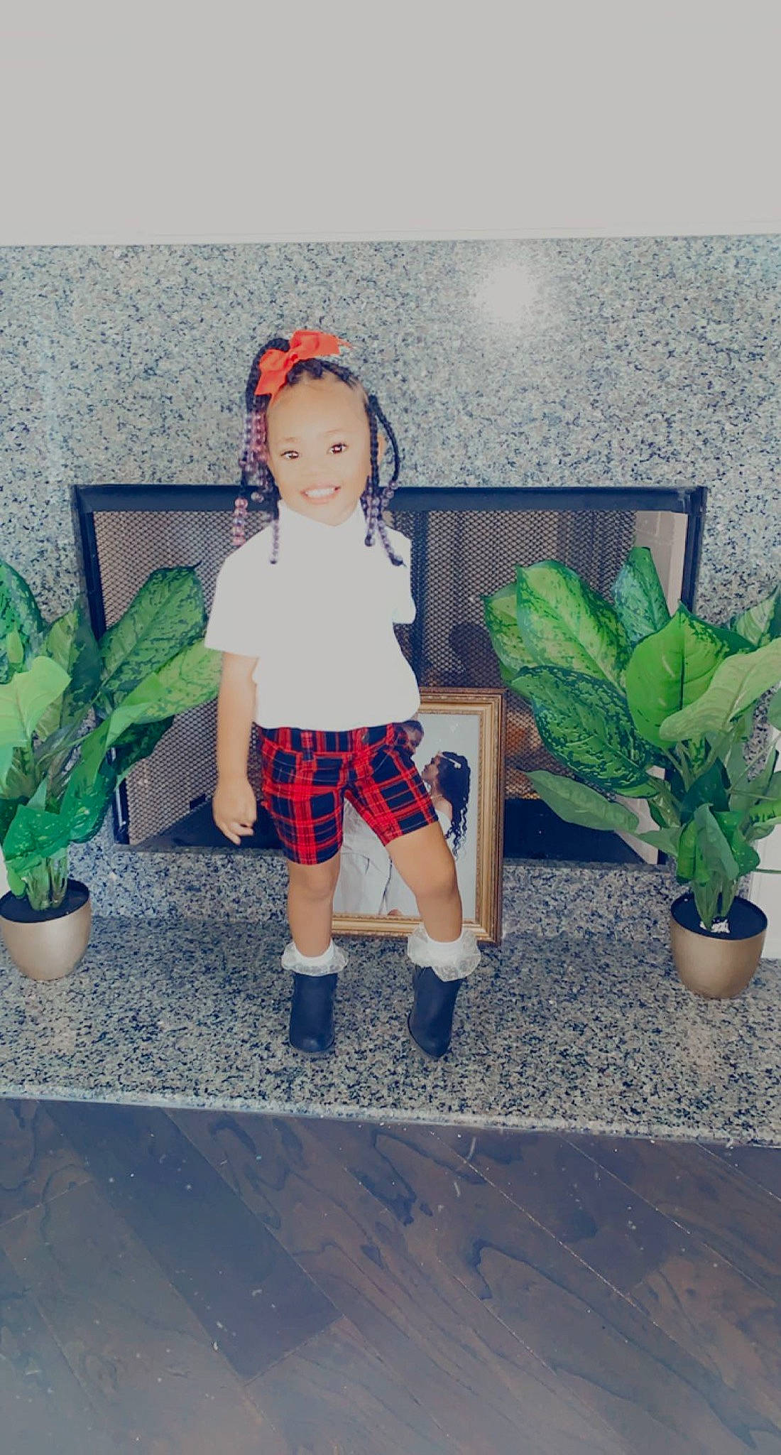 Cherish is registered to the contest to win money with this photo: denim, doll, electric_blue, fashion_design, flowerpot, grass, green, houseplant, human_leg, knee, person, plaid, plant, shorts, t_shirt, table, tartan, thigh, toy, tree