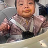 baby, high_chair, food, messy, face, bib, child, indoor, feeding, straps, clothing, person, cute, expression, table, seat, young, portrait, mess, dining