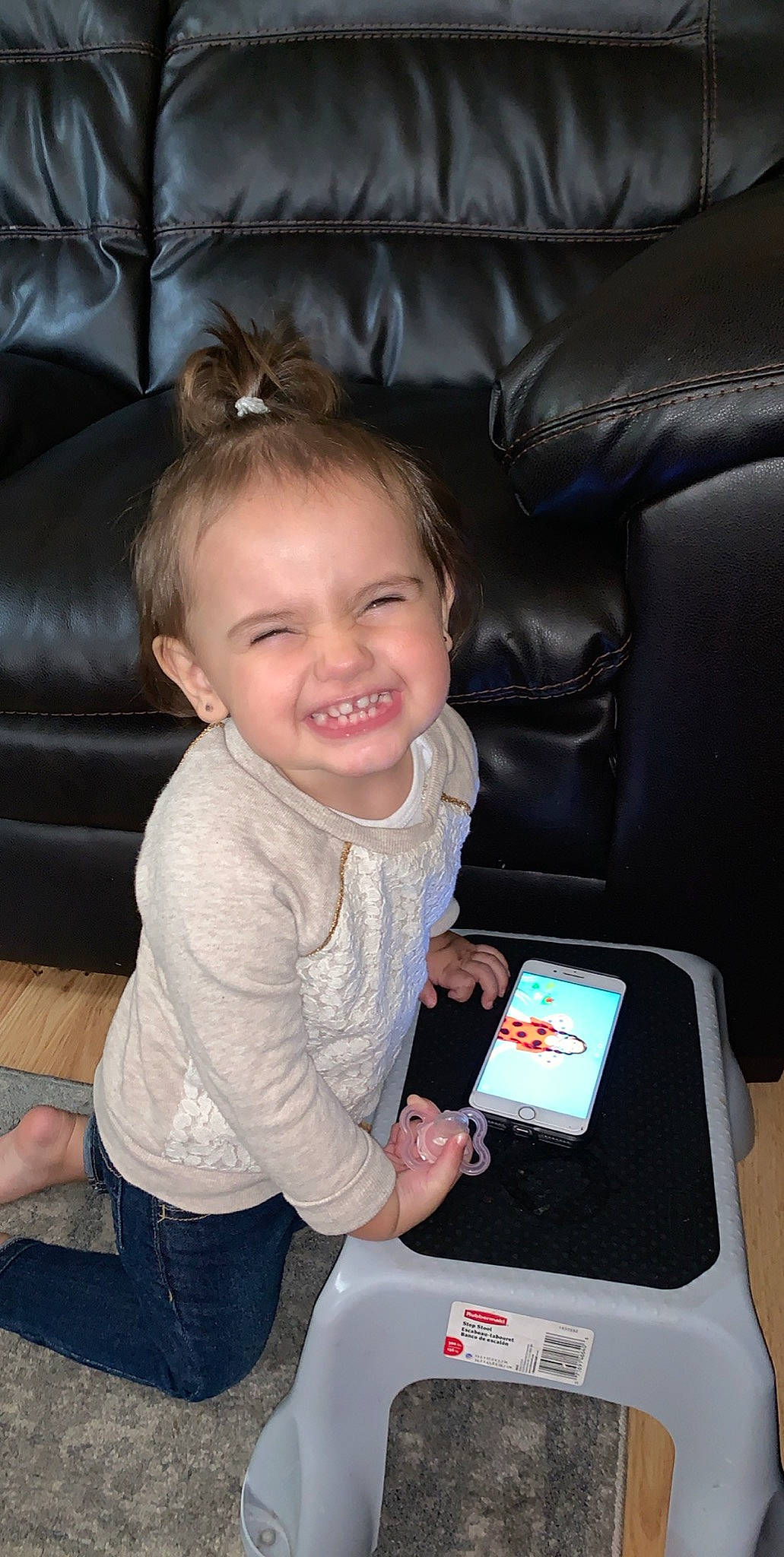 Gianna is registered to the contest to win money with this photo: baby, car_seat, child, electronic_device, fun, gadget, joy, lap, person, sitting, smile, technology, toddler