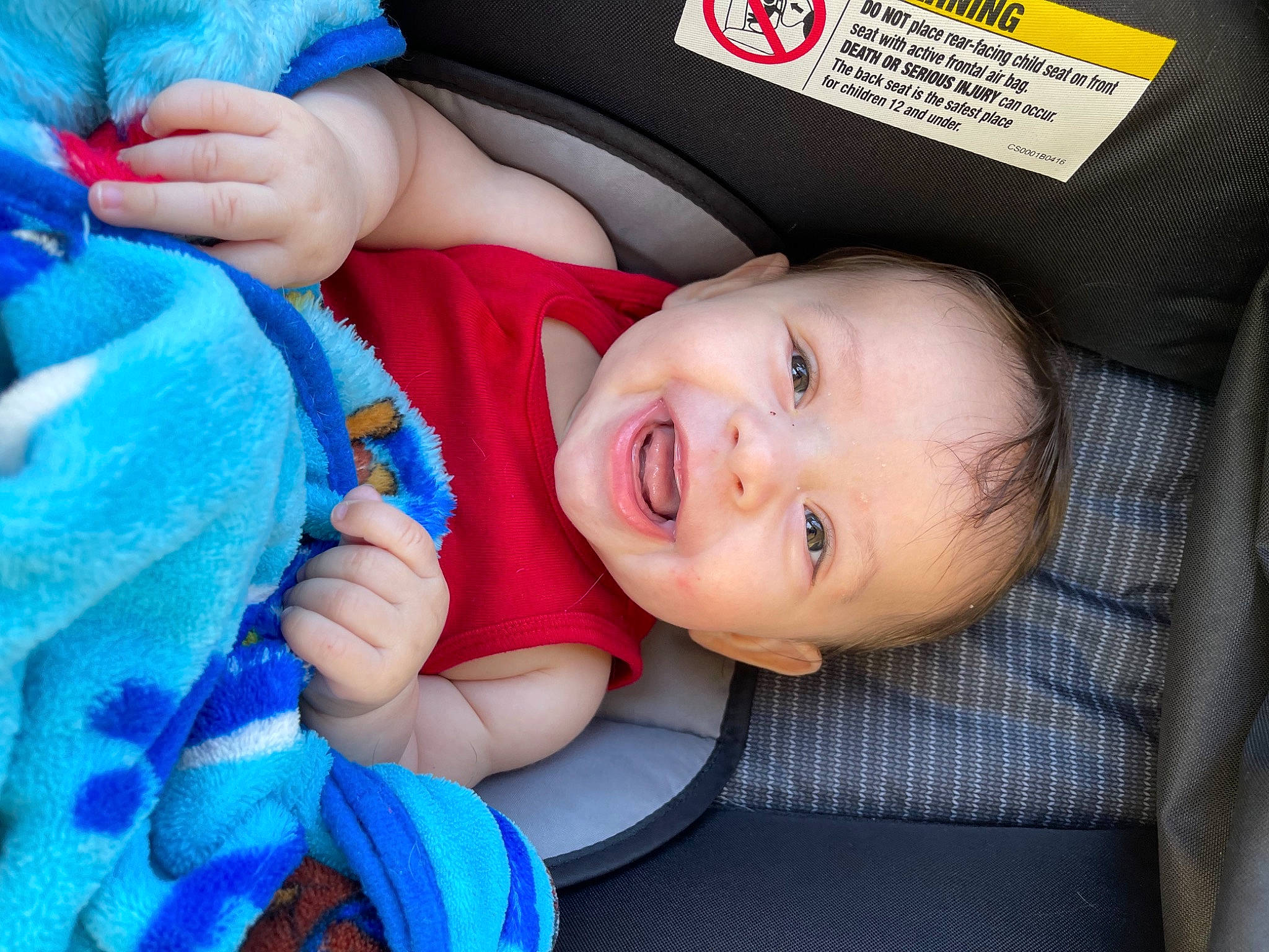 Lucca joined the competition — help win amazing prizes! baby, baby_carriage, baby_toddler_clothing, blue, car_seat, cheek, comfort, cool, face, finger, fun, gesture, happy, iris, mouth, nose, person, product, skin, smile