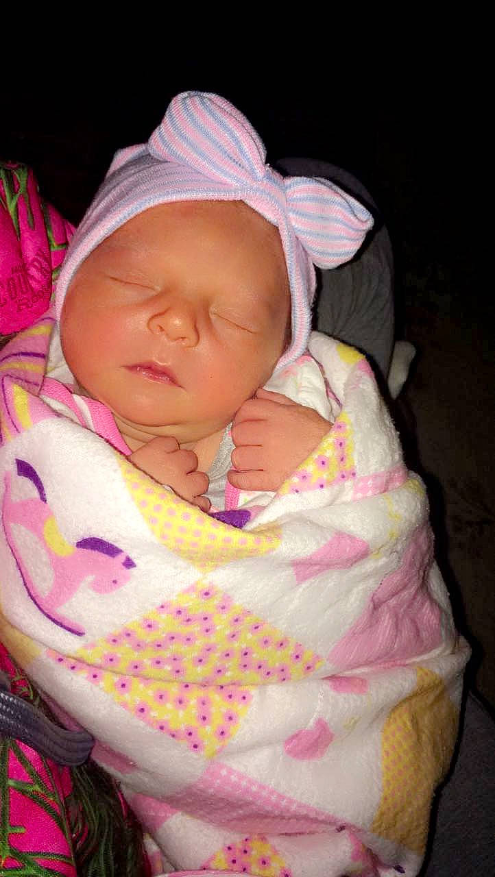 Kaliyah is registered to the contest to win money with this photo: baby, baby_products, baby_sleeping, baby_toddler_clothing, beanie, bedtime, cap, cheek, child, comfort, hand, hat, headwear, linens, magenta, nap, peach, person, pink, skin