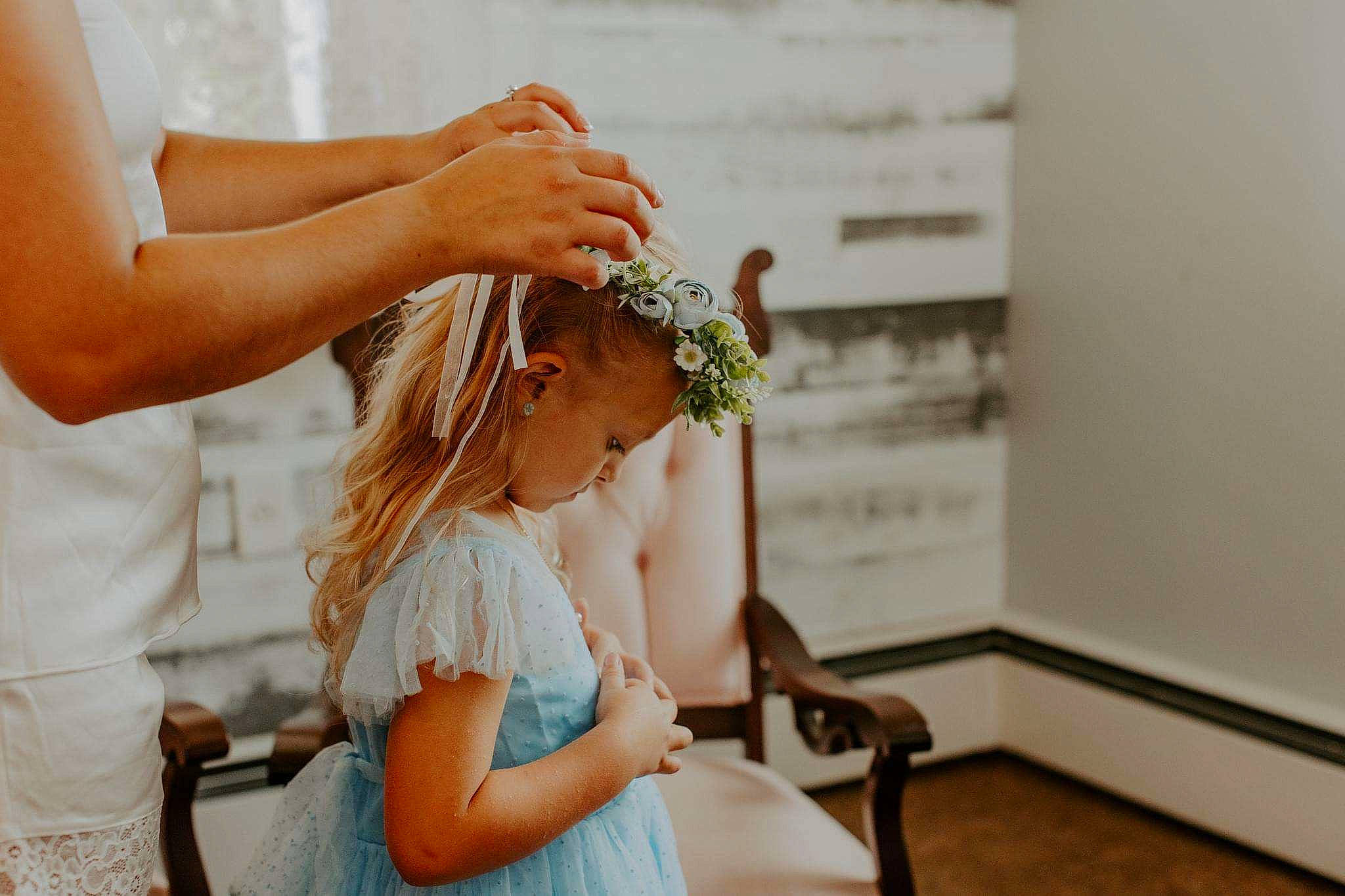 Kaliyah joined the competition — help win amazing prizes! bridal_accessory, bridal_clothing, child, dress, event, flower_arranging, formal_wear, gesture, gown, hand, happy, headpiece, jewellery, long_hair, marriage, person, plant, shoulder, waist, wedding_ceremony_supply