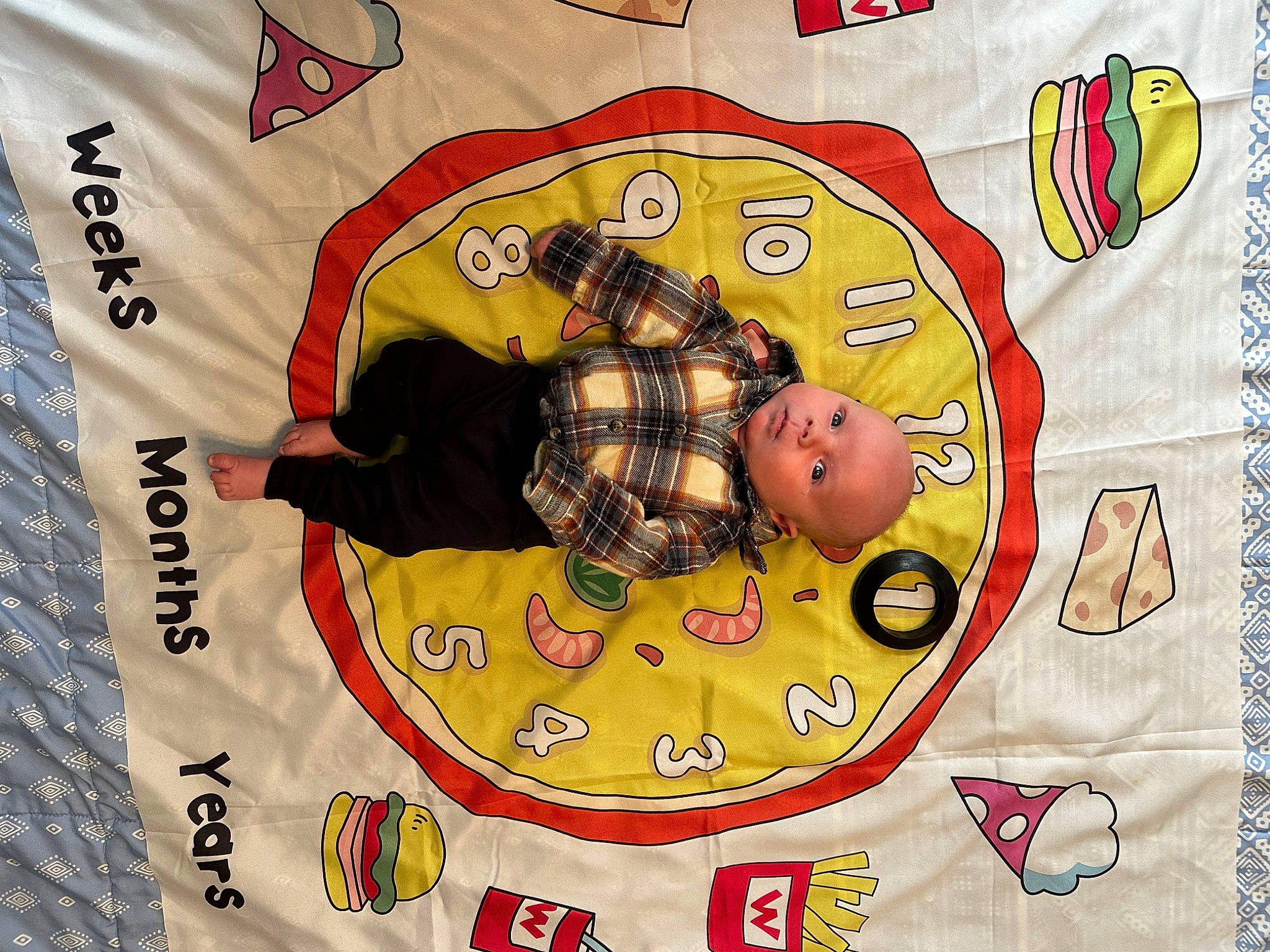 Charles is registered to the contest to win money with this photo: art, baby, baby_toddler_clothing, child, circle, creative_arts, font, graphic_design, graphics, happy, illustration, linens, painting, pattern, person, product, rectangle, sleeve, textile, toddler