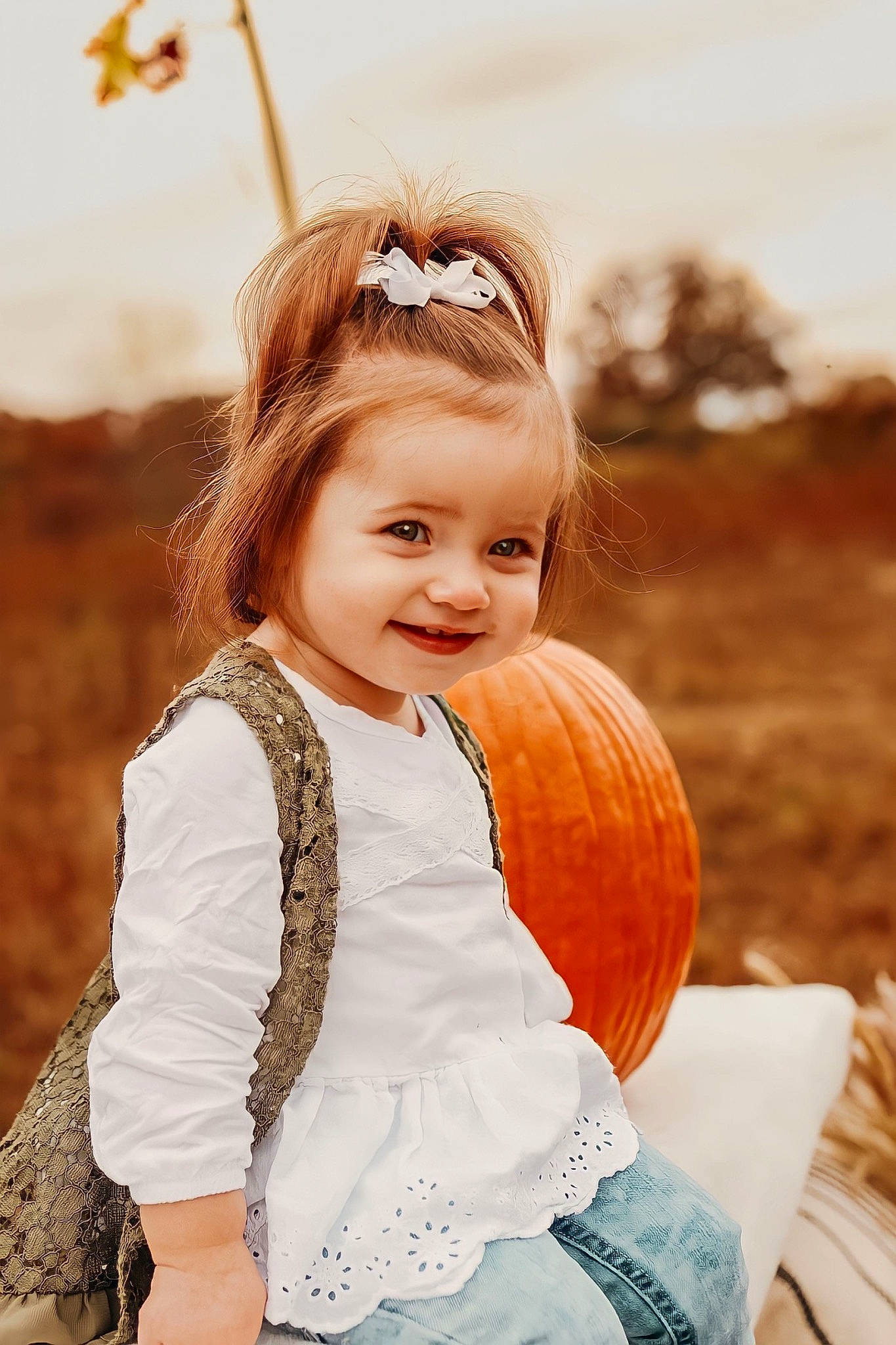 Taylynn joined the competition — help win amazing prizes! blond, calabaza, child, eyewear, face, flash_photography, fun, gourd, grass, happy, joy, orange, people_in_nature, person, plant, pumpkin, smile, sunlight, toddler, vegetable