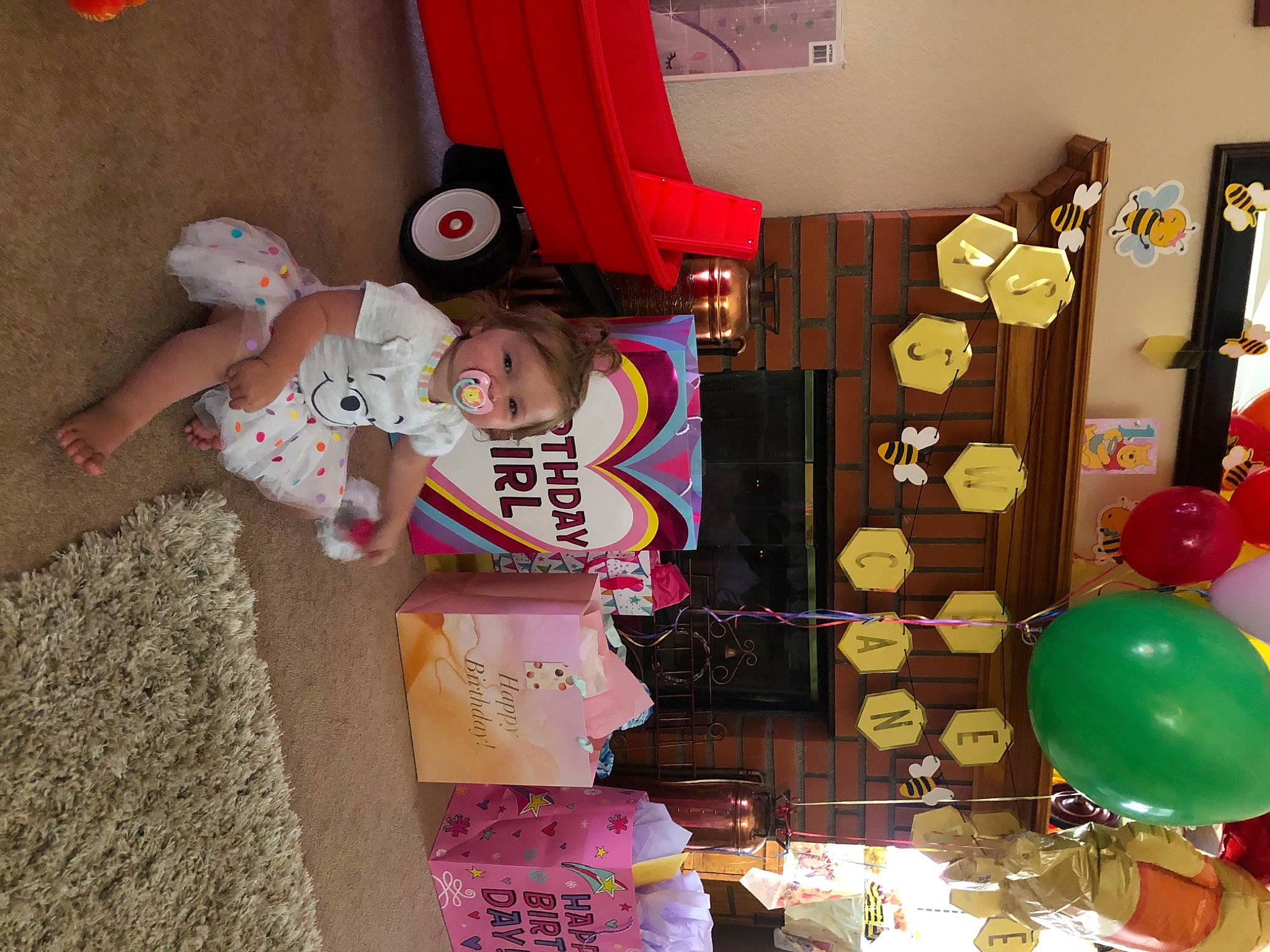 Saige joined the competition — help win amazing prizes! baby, baby_toddler_clothing, balloon, child, circle, curtain, decoration, event, hat, holiday, lighting_accessory, magenta, party_supply, person, pink, room, stuffed_toy, textile, toddler, toy