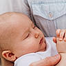 Daniel joined the competition — help win amazing prizes! baby, sleeping, hands, person, closeup, skin, face, infant, holding, comfort, peaceful, toddler, human, portrait, white_clothing, gentle, parent, caring, head, soft