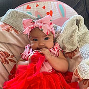 Halo joined the competition — help win amazing prizes! baby, infant, toddler, headband, bow, red_tutu, dress, blanket, bunny_seat, couch, plush, hands, teething, big_eyes, portrait, smiling, cozy, patterned_blanket, hearts, cute