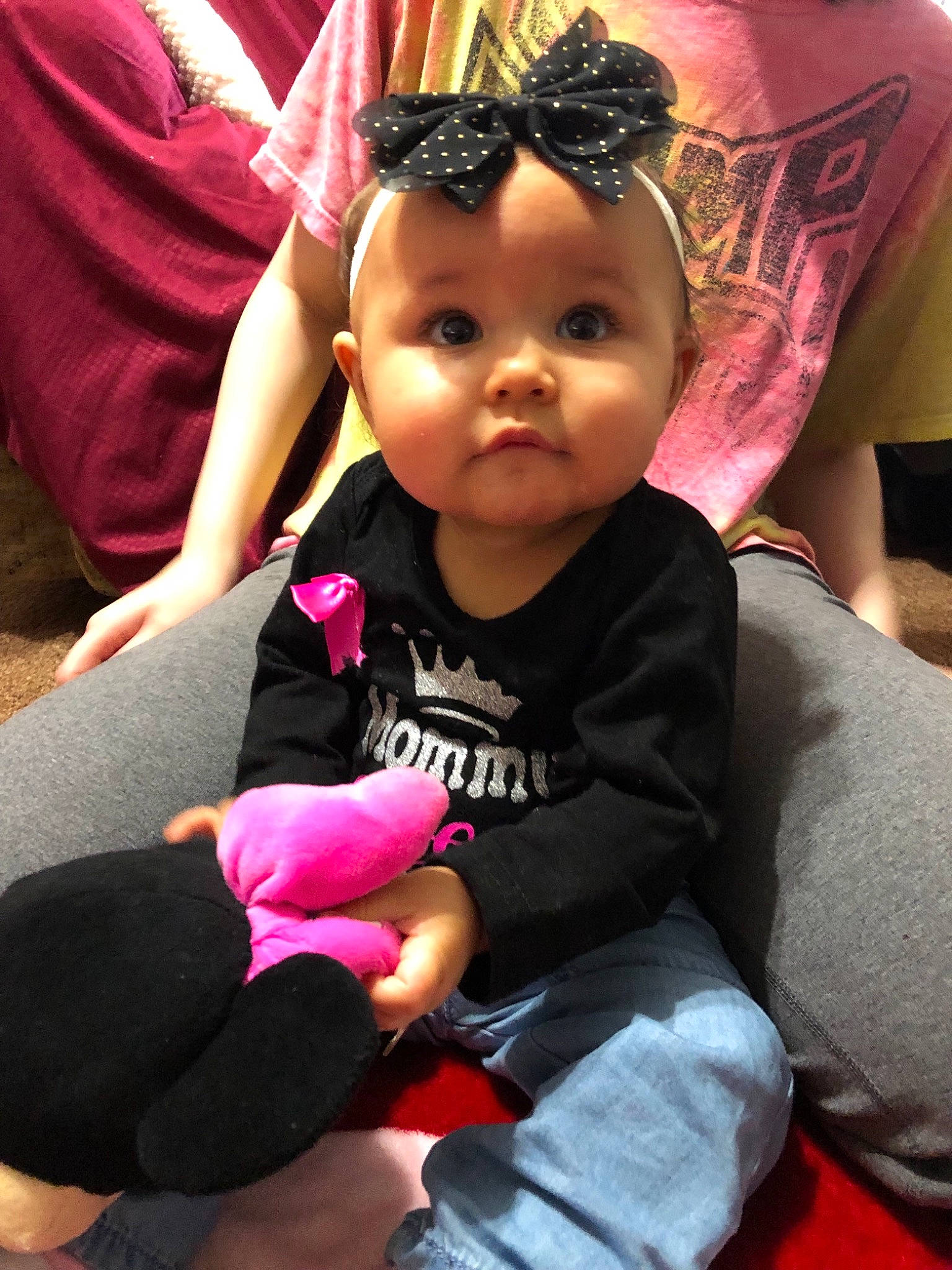 Katelyn joined the competition — help win amazing prizes! arm, baby, black_hair, car_seat, cheek, child, fun, hair_accessory, headband, magenta, person, pink, sitting, skin, smile, toddler