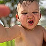 toddler, child, face, expression, outdoor, blurred_background, funny_face, skin, hair, mouth, eyes, summer, sunlight, nature, portrait, bare_chest, young, person, cute, closeup