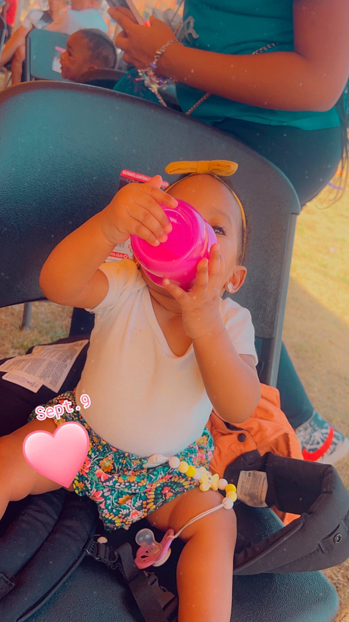 Adalee joined the competition — help win amazing prizes! abdomen, brassiere, cap, chest, child, happy, hat, human_leg, leg, leisure, mouth, orange, person, pink, summer, sun_hat, swimsuit_top, swimwear, thigh, trunk