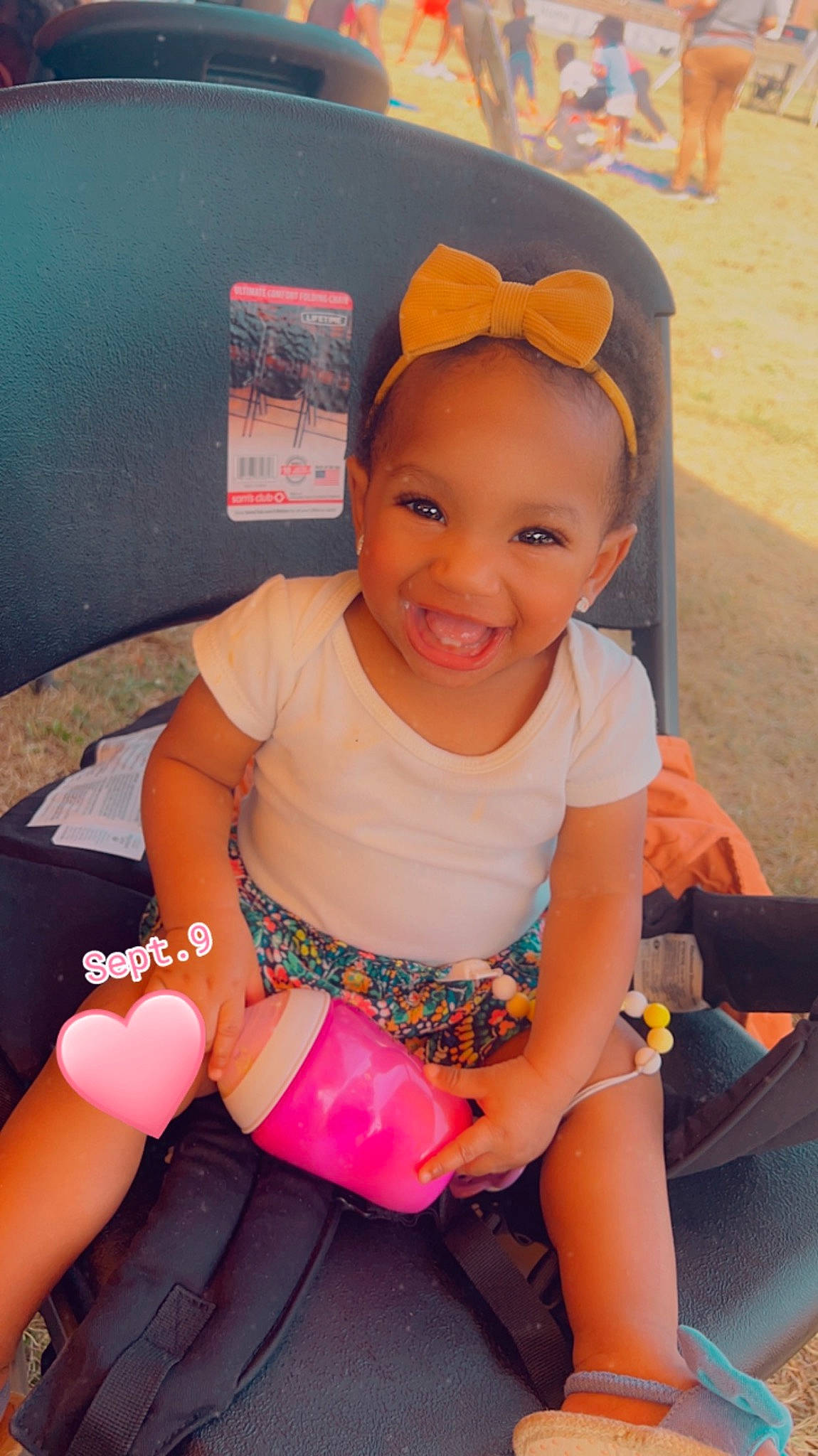 Adalee joined the competition — help win amazing prizes! baby_toddler_clothing, child, facial_expression, fun, happy, human_leg, joy, knee, lap, leisure, magenta, mouth, person, pink, play, recreation, sitting, skin, smile, sock