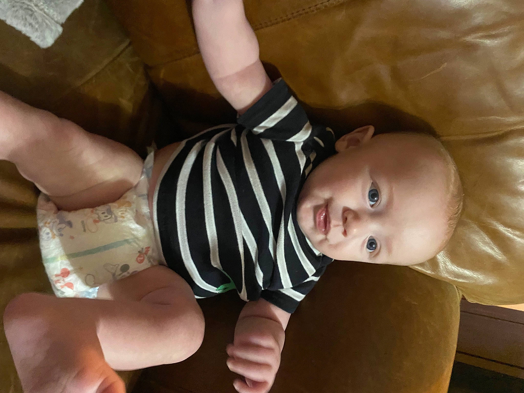 Connor joined the competition — help win amazing prizes! arm, baby, baby_toddler_clothing, cheek, comfort, eye, finger, gesture, hand, head, human_body, joint, lip, mouth, nose, person, product, skin, sleeve, thigh