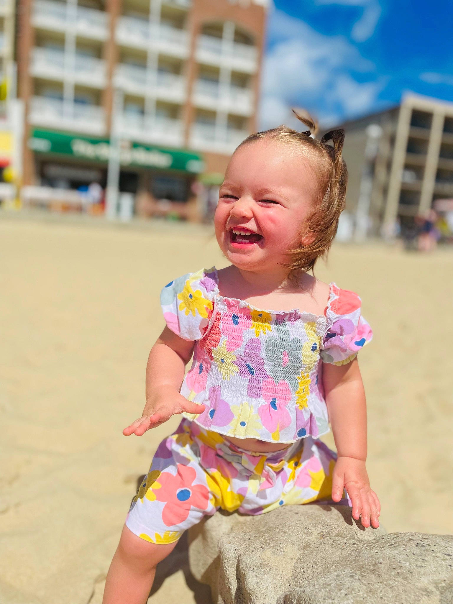 Adilynn joined the competition — help win amazing prizes! baby_toddler_clothing, beach, beauty, body_of_water, dress, face, fun, happy, leisure, person, photograph, pink, shorts, skin, sky, smile, summer, t_shirt, thigh, toddler