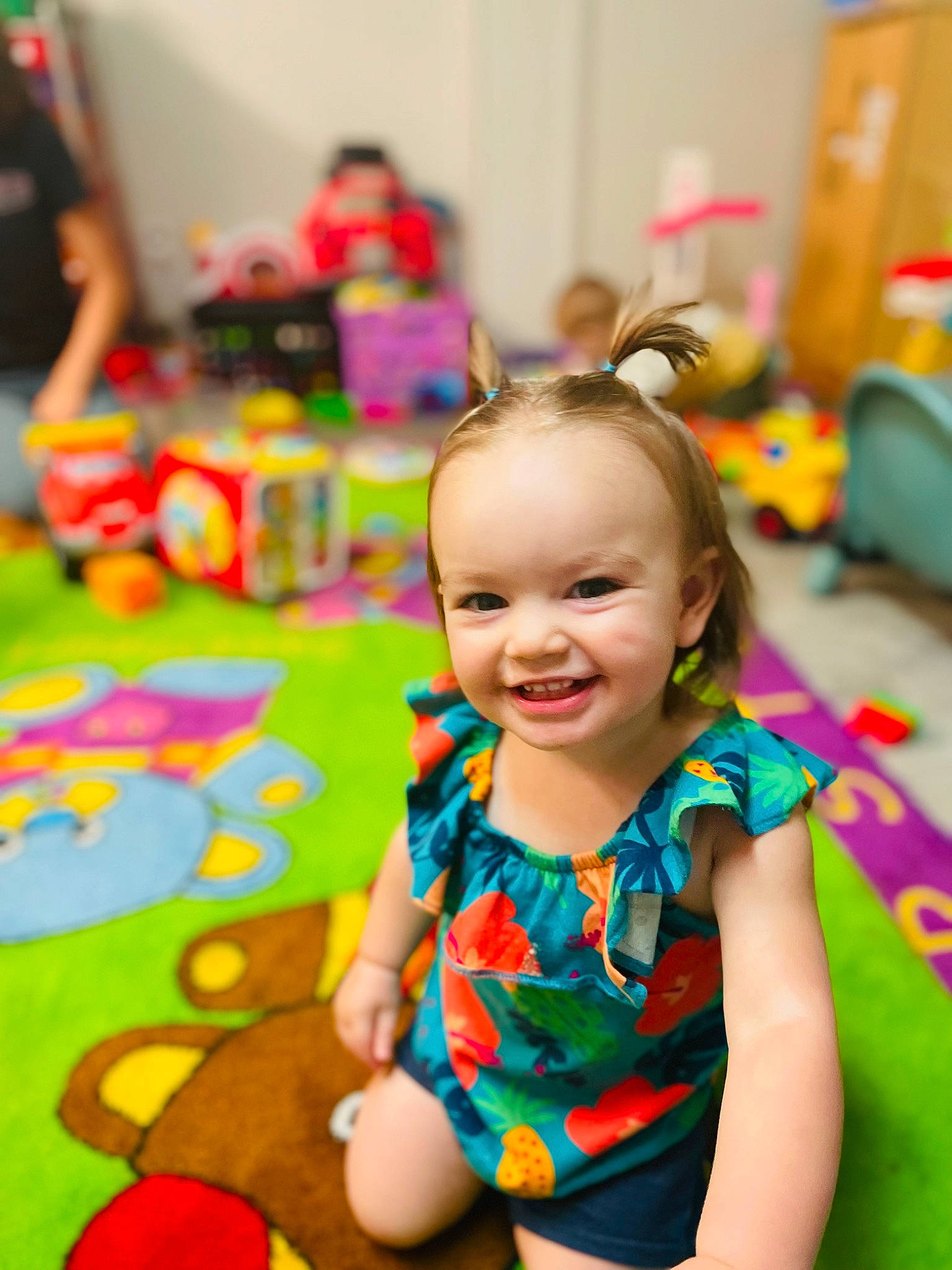 Adilynn joined the competition — help win amazing prizes! baby, baby_toddler_clothing, child, event, flooring, fun, happy, joy, kindergarten, leisure, party, person, play, room, shorts, sitting, skin, smile, t_shirt, toddler