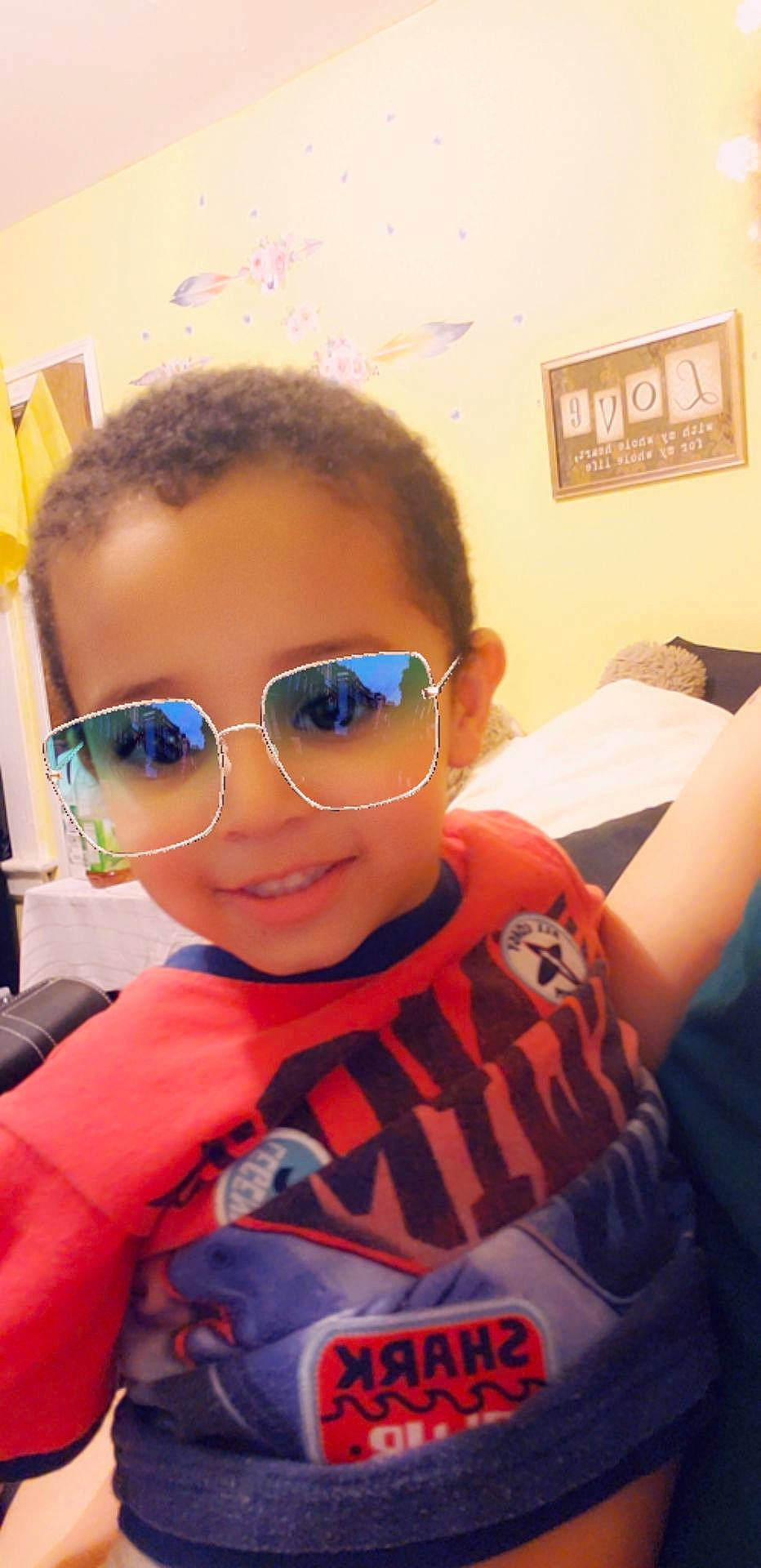 Jayden Holmes is registered to the contest to win money with this photo: black_hair, child, cool, eyewear, face, forehead, glasses, hair, hairstyle, head, person, photography, selfie, smile, sunglasses, toddler, vision_care