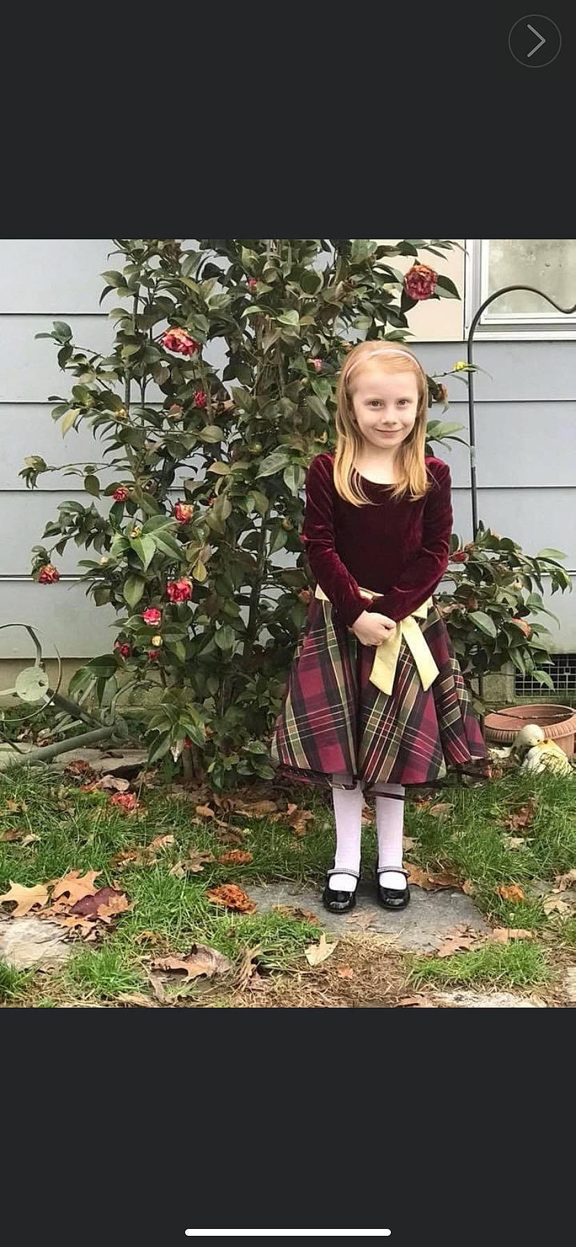 Jazmine joined the competition — help win amazing prizes! boot, branch, child, footwear, garden, grass, happy, holiday, joy, knee, leaf, pattern, person, plaid, plant, shrub, sitting, smile, sneakers, street_fashion