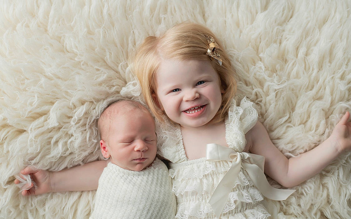 Madeline joined the competition — help win amazing prizes! baby, baby_toddler_clothing, blond, child, comfort, facial_expression, flash_photography, fun, gesture, happy, headgear, iris, joy, linens, person, pink, skin, sleeve, smile, textile