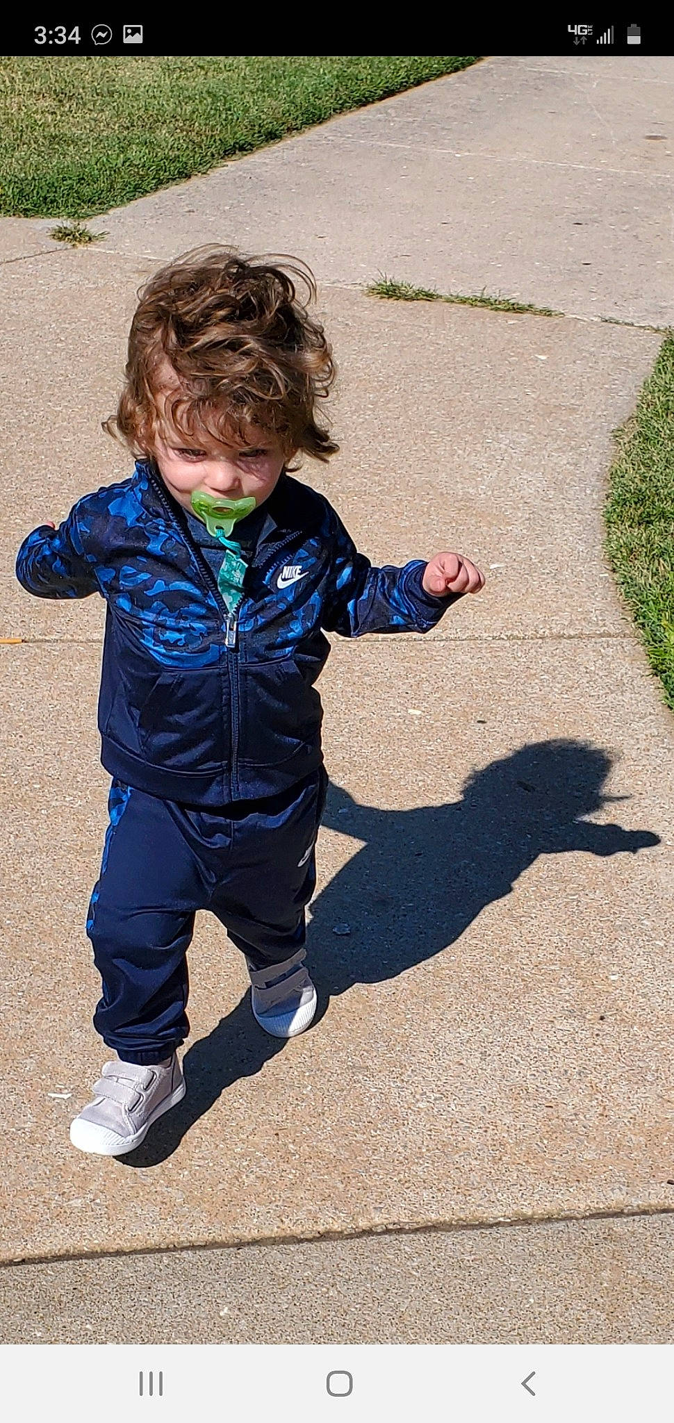 Gauge is registered to the contest to win money with this photo: child, fun, jacket, jeans, person, play, shadow, toddler