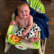 Josiah joined the competition — help win amazing prizes! baby, child, smiling, fisher_price, baby_rocker, blanket, plush_toy, indoor, floor_tiles, cute, infant, seat, colorful, happy, baby_clothing, toy, foot, hand, face, portrait