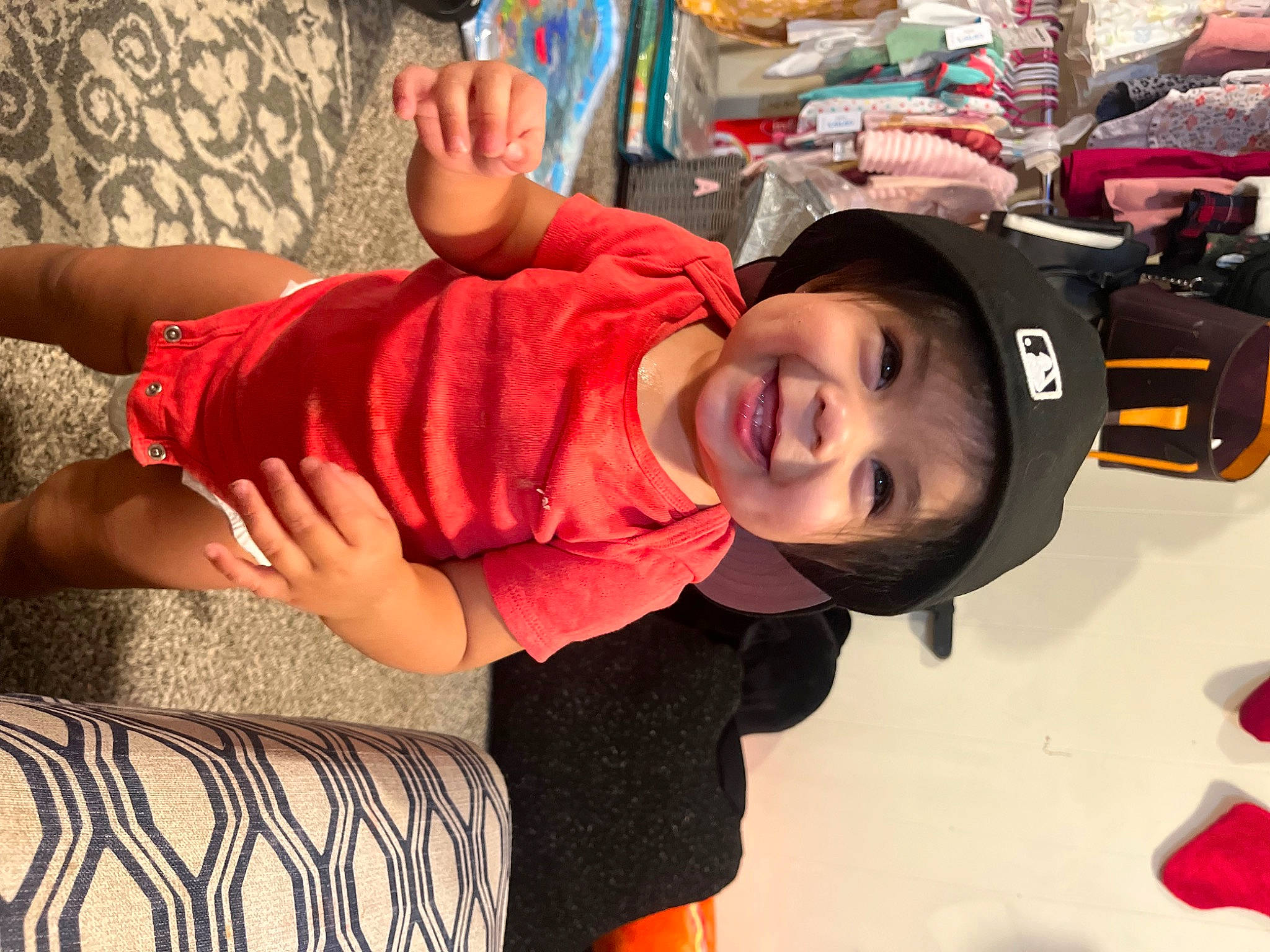 Ariel joined the competition — help win amazing prizes! baby, baby_toddler_clothing, baseball_cap, cap, child, comfort, elbow, foot, fun, happy, hat, headwear, human_leg, joy, leisure, mouth, person, play, red, smile