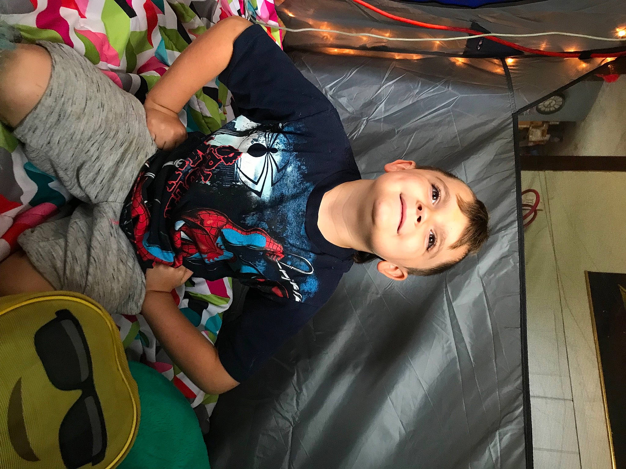 Dominic is registered to the contest to win money with this photo: child, cool, entertainment, event, fashion, flash_photography, fun, happy, hat, human, joy, leisure, mouth, people, person, recreation, shorts, sitting, t_shirt, thigh