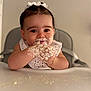 Léna participe au concours pour gagner de l'argent avec cette photo : baby, bib, child, cream, cute, face, feeding, food, hands, happy, high_chair, indoor, infant, mess, messy, playful, portrait, smile, table, young_child