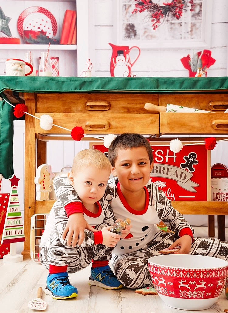 Yadi is registered to the contest to win money with this photo: baby, baby_toddler_clothing, child, cup, drinkware, event, fun, happy, holiday, joy, orange, person, play, red, room, shelf, sitting, smile, snapshot, t_shirt