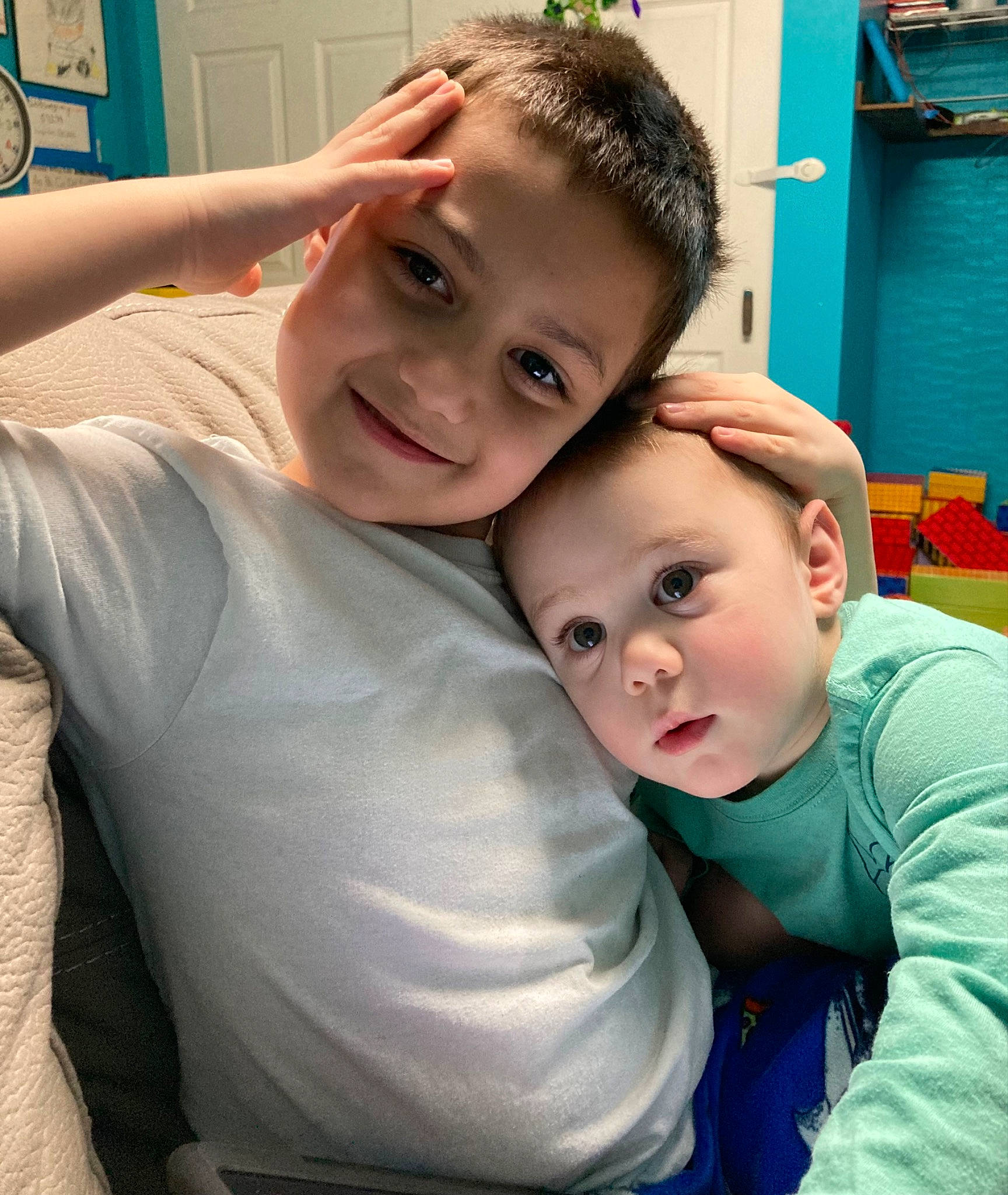 Yadi is registered to the contest to win money with this photo: blue, cheek, chin, cool, eye, friendship, fun, gesture, happy, human_body, interaction, iris, joy, leisure, mouth, nose, person, plant, skin, smile