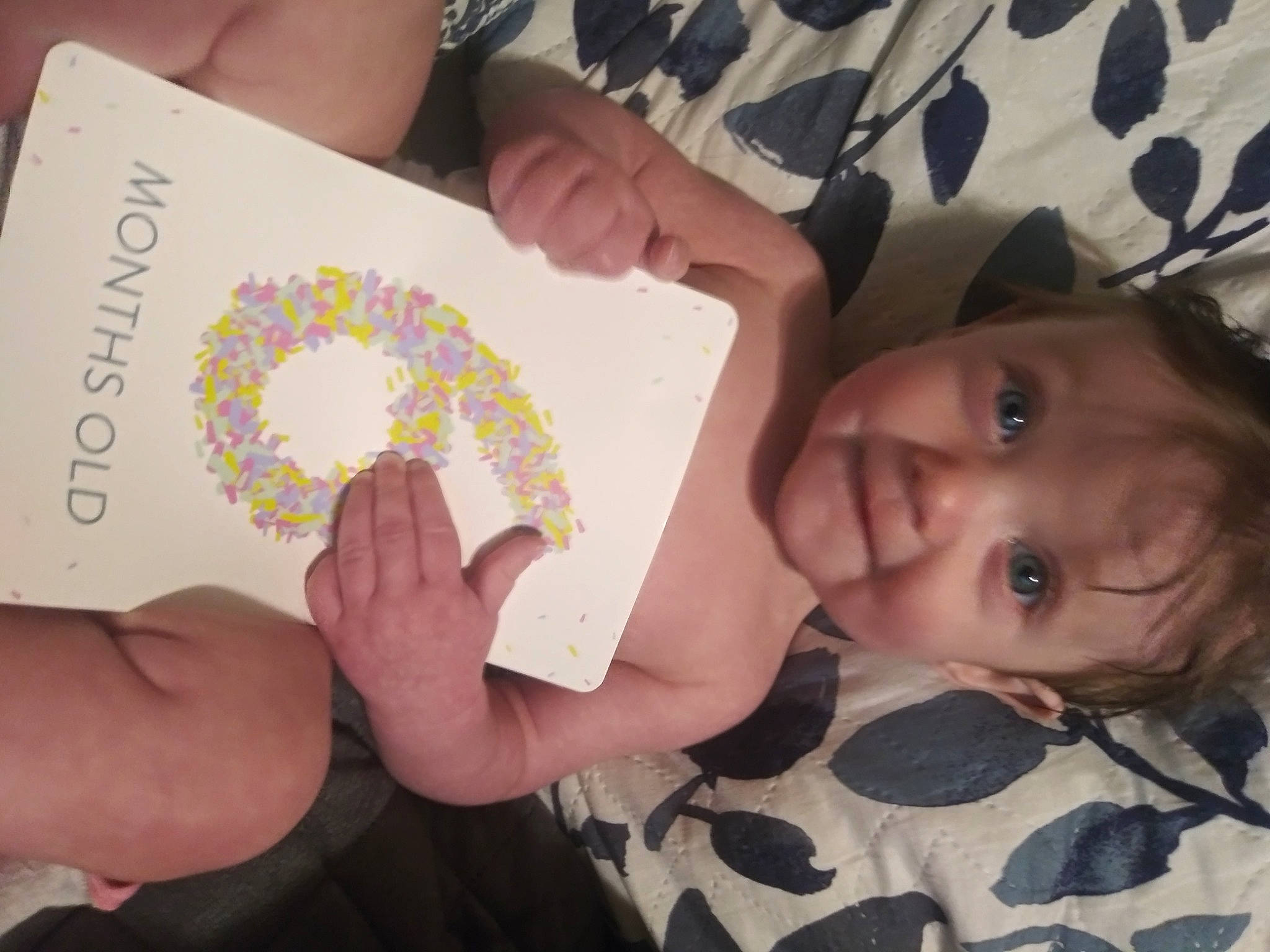 Armani is registered to the contest to win money with this photo: art, baby, baby_toddler_clothing, child, circle, finger, font, fun, gesture, hand, happy, nail, pattern, people, person, skin, textile, thumb, toddler, visual_arts