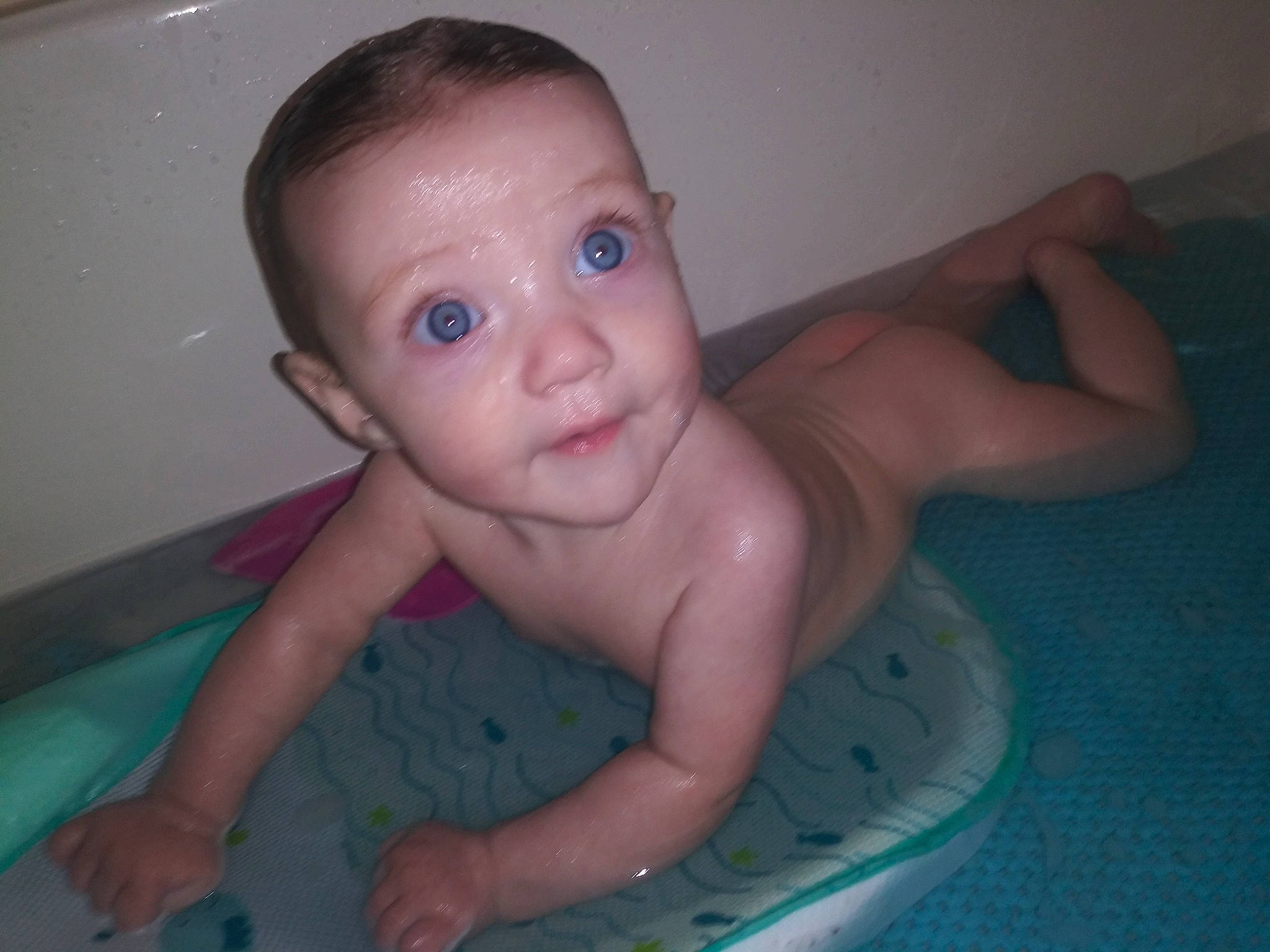 Armani is registered to the contest to win money with this photo: baby, baby_bathing, baby_products, baby_toddler_clothing, bathing, cheek, chest, child, eyebrow, finger, flooring, fun, iris, mouth, nose, person, skin, stomach, thumb, toddler