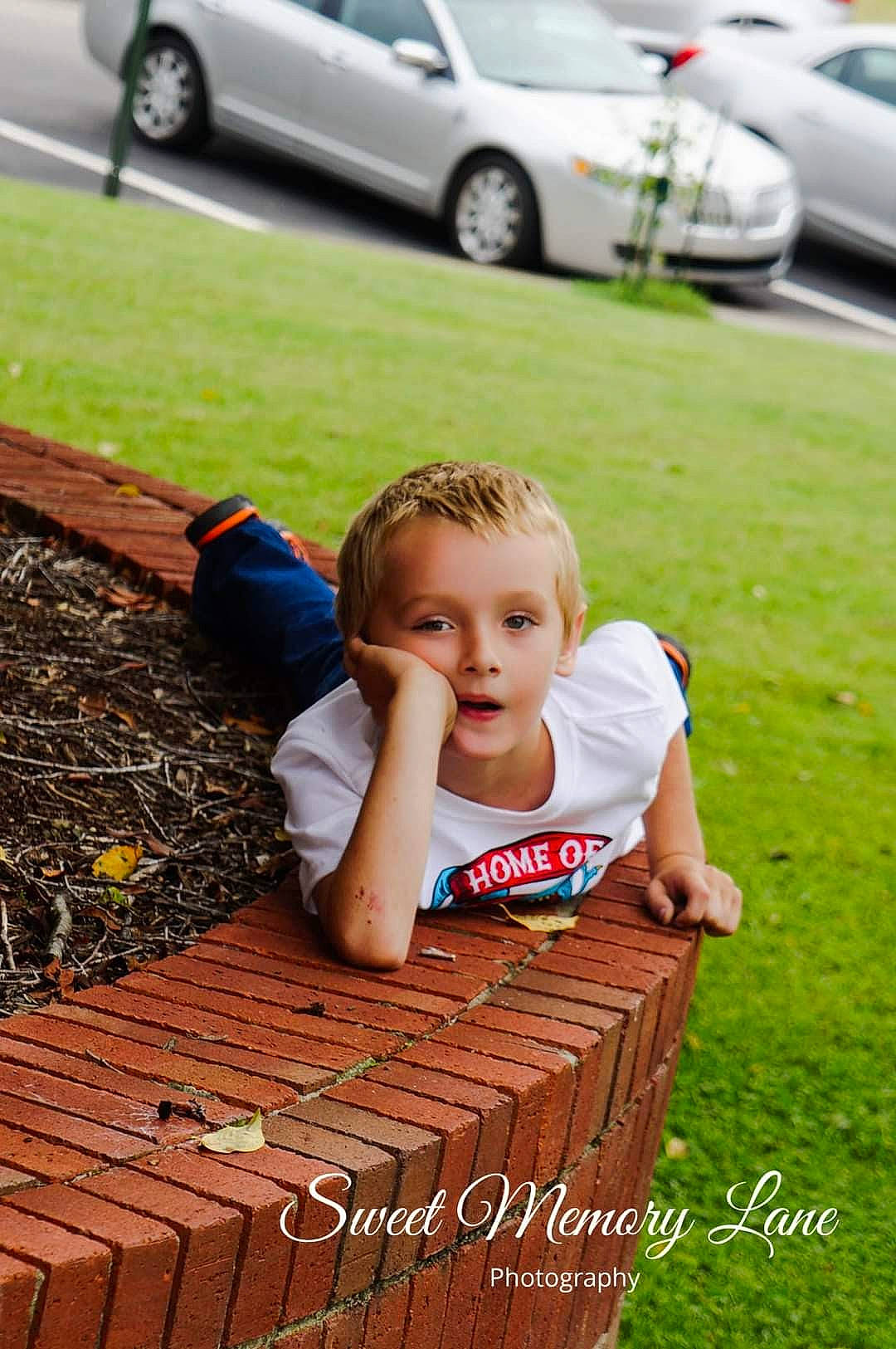 Robert joined the competition — help win amazing prizes! automotive_design, automotive_exterior, automotive_lighting, automotive_tire, car, grass, green, hair, happy, leaf, light, motor_vehicle, person, photograph, plant, tire, vehicle, vehicle_door, wheel, wood