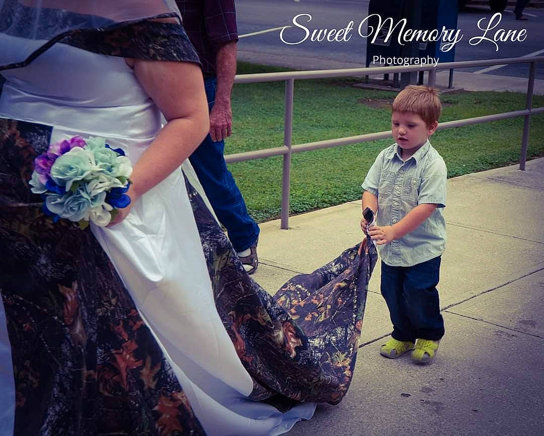 Aydin is registered to the contest to win money with this photo: bridal_clothing, bridal_party_dress, cool, dress, electric_blue, event, formal_wear, fun, gesture, gown, grass, hairstyle, happy, luggage_and_bags, people, person, street_fashion, style, summer, waist