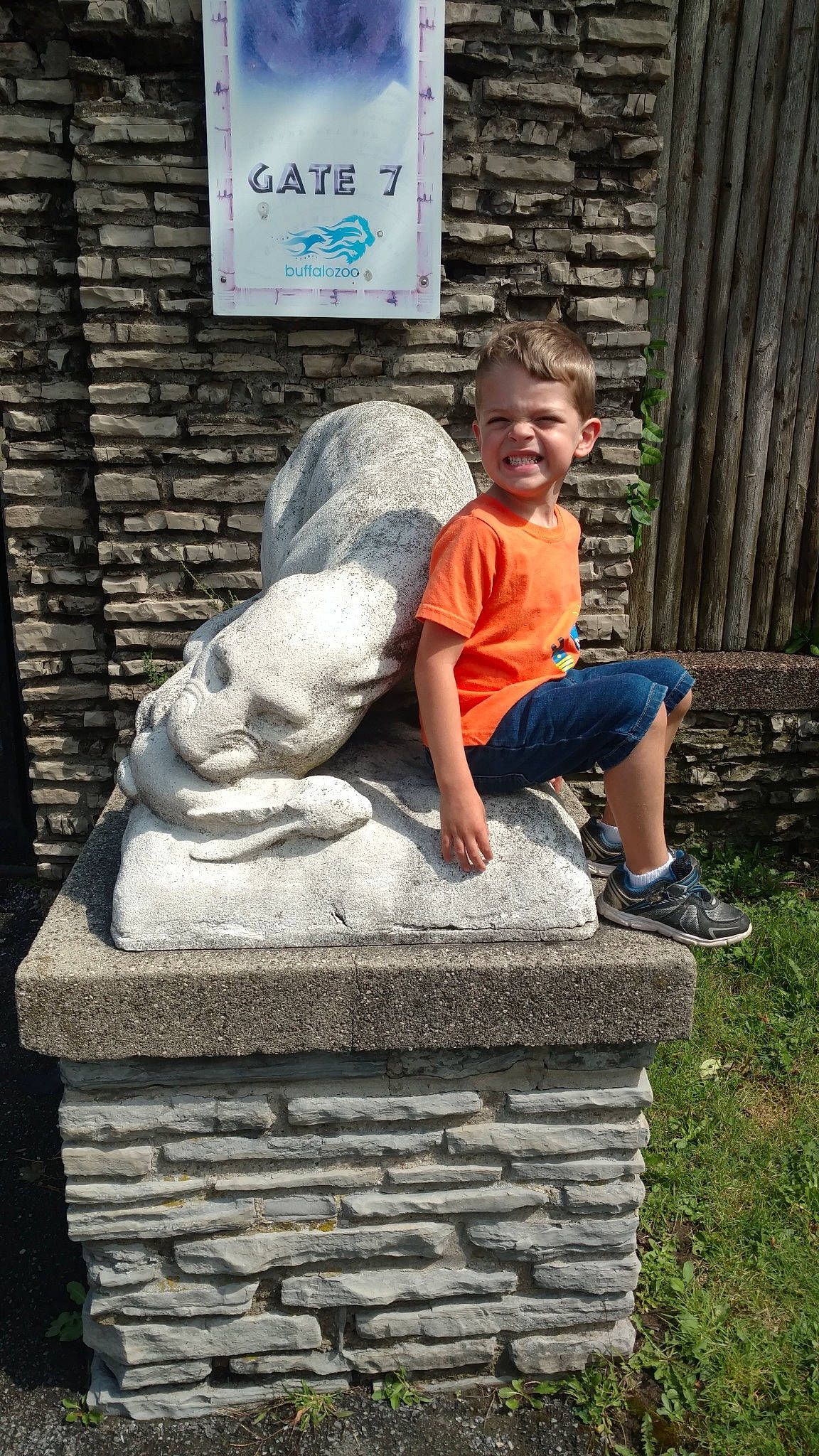 Broderick is registered to the contest to win money with this photo: leisure, person, sitting, stone_wall, temple, vacation