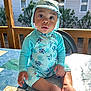 Hayden participe au concours pour gagner de l'argent avec cette photo : baby, child, outdoor, sun_hat, blue_outfit, tablecloth, wooden_porch, curious, sitting, sunlight, patterned, face, person, barefoot, summer, nature, greenery, daylight, expression, casual