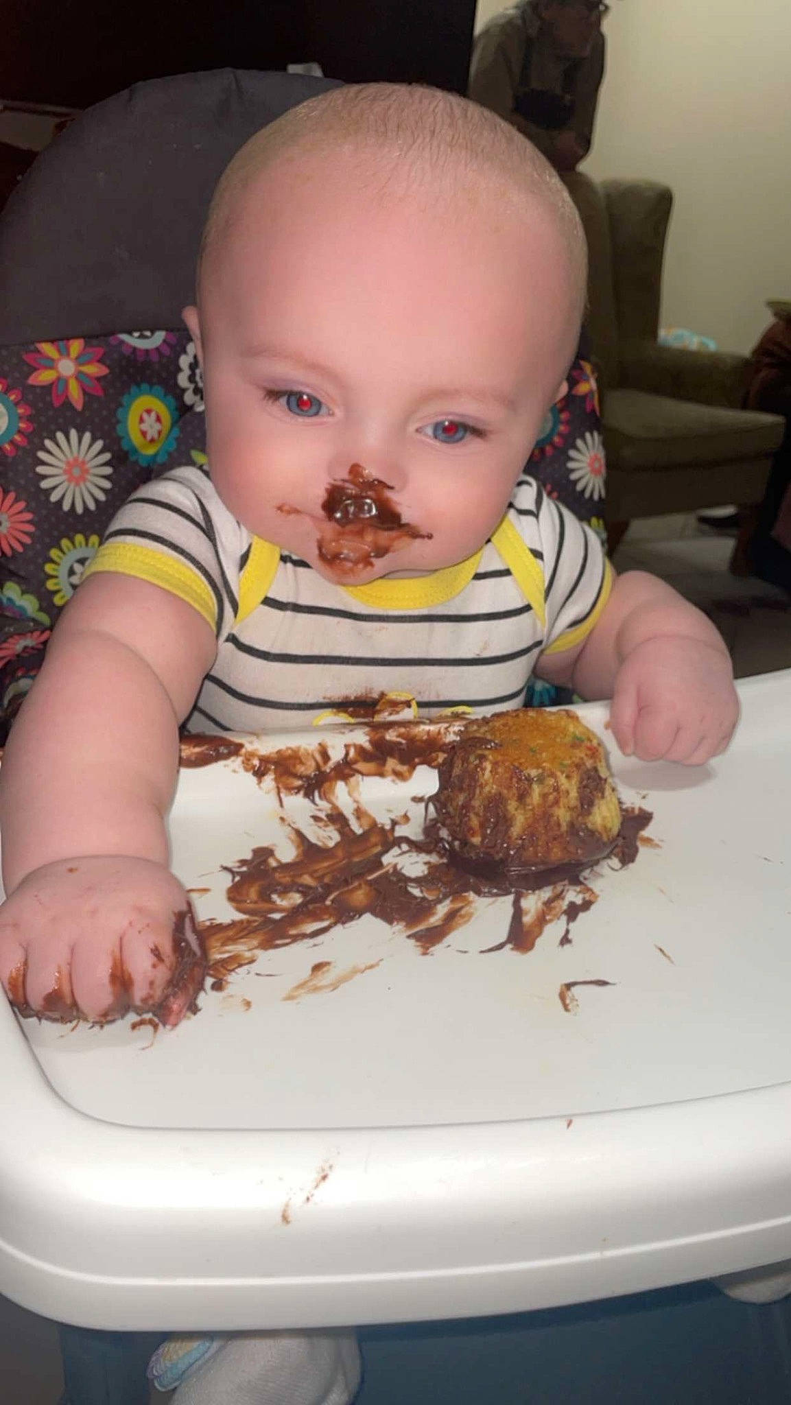 Laramie is registered to the contest to win money with this photo: baby, baby_toddler_clothing, chair, child, comfort_food, cooking, cuisine, dish, eating, fast_food, food, food_craving, ingredient, junk_food, person, plate, recipe, sitting, sweetness, tableware